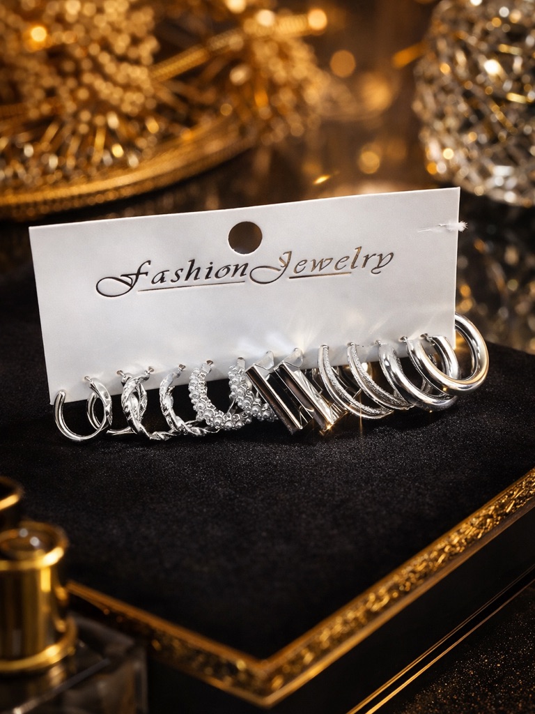 Fashion Nova Silver Multi-Style Hoop And Stud Earring Set 10$